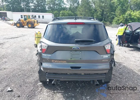 2017 Ford Escape Titanium z USA, uszkodzony, nr VIN 1FMCU0J90HUA19002